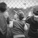 Boys at a fence